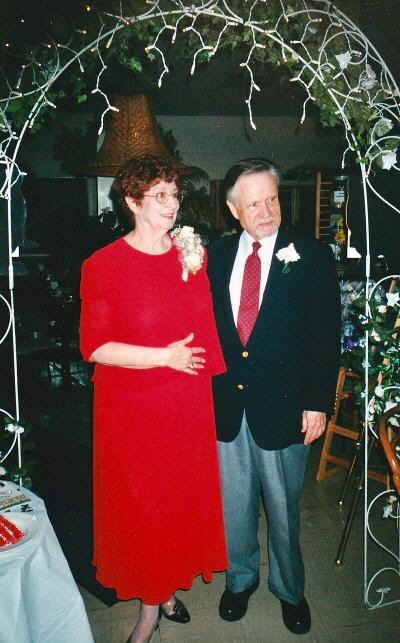 A man and a woman pose for a photo.