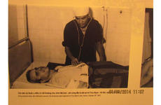 A Vietnamese doctor is shown treating John McCain at the ''Hanoi Hilton'' prison after his jet was shot down during the Vietnam War. McCain later became a U.S. senator and unsuccessful candidate for president.