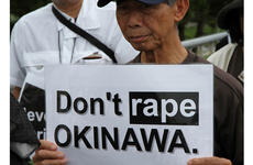 Approximately 2,000 protesters rallied in front of the gate at Marine Corps headquarters on Camp Foster Sunday, May 22, 2016, to protest the U.S. military presence in Okinawa after a former U.S. Marine who worked as a civilian on Kadena Air Base confessed to the brutal slaying of a 20-year-old local girl.