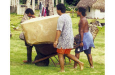 Residents of an outer island of Palau retrieve boxes from the U.S. Air Force’s 1999 Christmas drop.
