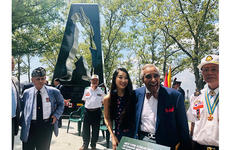 Hannah Kim with Korean War veteran and former congressman Charlie Rangel at the New York Korean War Veterans Memorial.