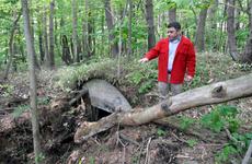 Richard Clark, 35th Fighter Wing historian, explains Thursday how a couple of airmen accidentally discovered what is believed to be a World War II-era, Japanese military bunker in the woods on Misawa Air Base, Japan.