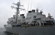 The destroyer USS Barry arrives at Yokosuka Naval Base, Japan, the ship's new homeport, on March 14, 2016.