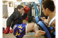 David Archuleta, left, mixes it up with sparring partner Masaaki Kato.