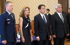 U.S. Forces Japan commander Lt. Gen. John Dolan, from left, U.S. Ambassador to Japan Caroline Kennedy, Foreign Minister Fumio Kishida and Defense Minister Gen Nakatani appear before reporters before discussing changes to procedures under the status of forces agreement, Tuesday, July 5, 2016, in Tokyo.