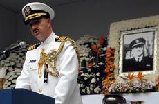 Capt. James Tranoris, Commander, Naval Forces Korea speaks in front of a photo of William Hamilton Shaw, a Korean-born U.S. Navy officer who died during the Korean War.