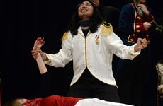 Romeo, portrayed by Zama Middle-High School's Justin Iriarte, and Corban Olson play out the scene of Mercutio's death, during their performance of the one-act play "Romeo and Juliet: Six Very Busy Days," during the Far East Drama Festival at Camp Humphreys, South Korea, Feb. 9, 2023.