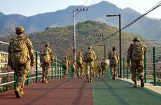 U.S. and South Korea troops take part in a ruck march at Camp Casey, South Korea, April 22, 2022.