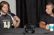 Humphreys High School senior football player Brent Carver and coach Steven Elliott take turns co-hosting "Breakfast with Sports Byline" at the Camp Humphreys, South Korea, Sept. 5, 2019.