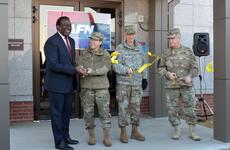 From left to right: Ray Shepherd, Defense Media Activity director; Brig. Gen. Tammy Smith, 8th Army deputy commanding general for sustainment; Maj. Gen. James Walton, U.S. Forces Korea director of transformation and restationing; and Col. Joseph Holland, Camp Humphreys garrison commander; take part in a ribbon-cutting ceremony, Tuesday, Nov. 15, 2016, to mark the grand opening of American Forces Network Pacific Korea's new headquarters at Humphreys.