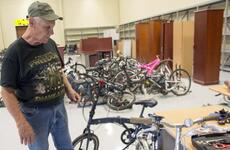 Army veteran Daniel Melton prepares to fix another abandoned bicycle at Camp Humphreys, South Korea, Sept. 12, 2023. 