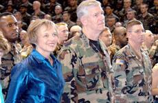 Chairman of the Joint Chiefs of Staff Gen. Richard B. Myers and his wife Mary Jo watch Sunday’s USO show.