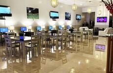 The new USO Tumon Bay on Guam features a lounge and gaming room with several big-screen televisions. Reading areas and stress relieving massage chairs add to a relaxed setting, and a conference room is set aside for private meetings.