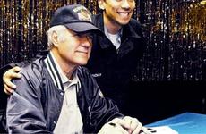 Jeopardy! game show host Alex Trebek donned the hat of USS Kitty Hawk Petty Officer 2nd Class Errol Dychiuchay Thursday when the show stopped at Yokosuka Naval Base. Trebek and Jeopardy representatives are visiting bases in Japan and Okinawa this week to scout contestants and show support for the troops.