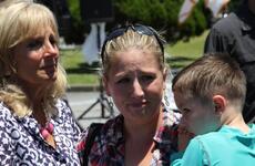 Jill Biden, wife of Vice President Joe Biden, left, sheds a tear with Maureen Rosenblatt, holding her son Nathaniel, July 23, 2015, at Kadena Air Base in Okinawa, Japan. Biden stopped by the base in support of her and first lady Michelle Obama's Joining Forces initiative to support servicemembers, veterans and their families.