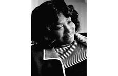 Gospel singer Mahalia Jackson talks to a reporter at her Tokyo hotel. 