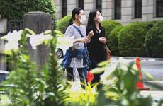 Women wear masks while out and about in Yokohama, Japan, May 24, 2021.