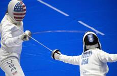 A U.S. women’s Olympic fencing team cadet athlete, Amanda Pirkowski, left, spars with Olympian Kelley Hurley inside Lotus Culture Center Arena at the Atago Sports Complex in Iwakuni, Japan, July 16, 2021.