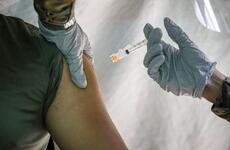 A Marine receives the Moderna COVID-19 vaccine at the naval hospital on Camp Foster, Okinawa, Feb. 18, 2021.