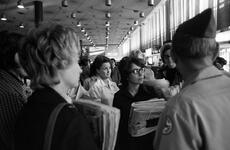 A group of Red Cross registered nurses and volunteers arrive at Yokota Air Base