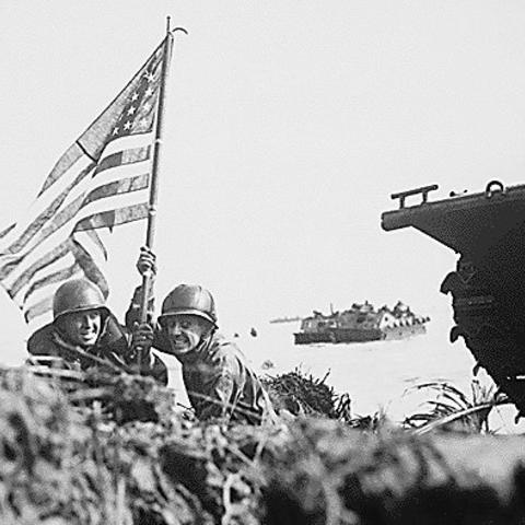 Marines plant the US flag on Guam
