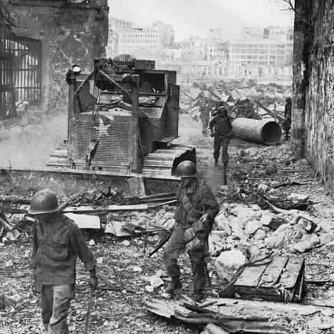 U.S. troops pictured in rubble of the Manilla.
