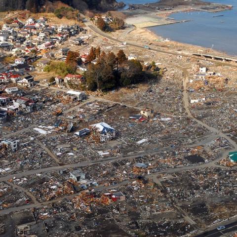 An aerial view of earthquake and tsunami damage to Sukuiso, Japan