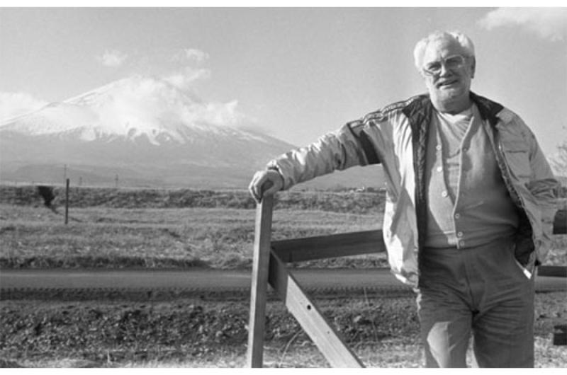 On a USO tour of Japan in 1982, comedian Foster Brooks performs for Marines at Camp Fuji; shakes hands with Cpl. Richard Carlson after a game of pool; and poses with Mt. Fuji in the background.