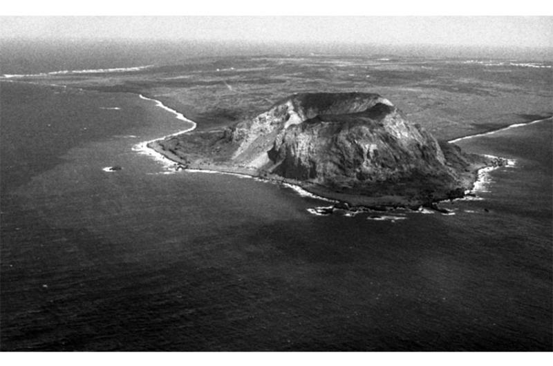 Mount Suribachi, as seen from a plane carrying Iwo Jima flag raiser Rene Gagnon and his family to the island in February, 1965.