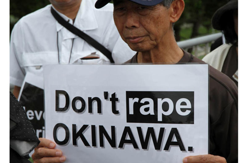 Approximately 2,000 protesters rallied in front of the gate at Marine Corps headquarters on Camp Foster Sunday, May 22, 2016, to protest the U.S. military presence in Okinawa after a former U.S. Marine who worked as a civilian on Kadena Air Base confessed to the brutal slaying of a 20-year-old local girl.