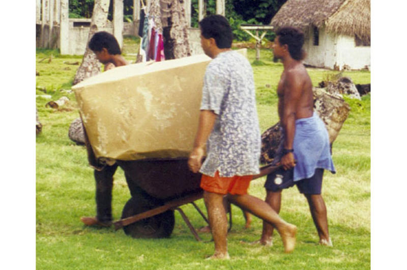 Residents of an outer island of Palau retrieve boxes from the U.S. Air Force’s 1999 Christmas drop.