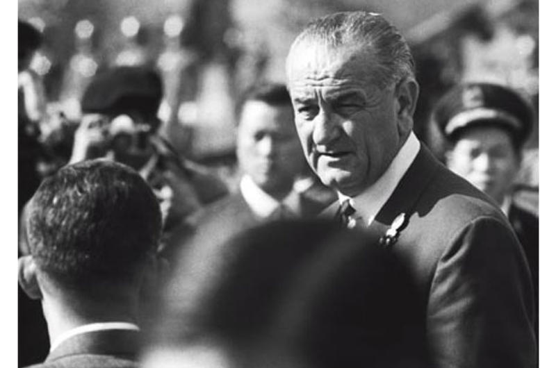 President Johnson talks with troops from the 26th ROK Division.