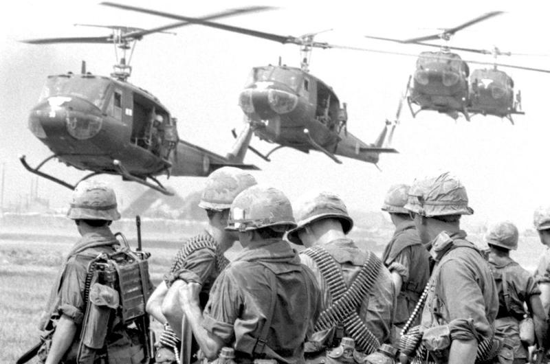 South Vietnam, April, 1967: Helicopters stream in to take soldiers from the 27th Infantry, 25th Infantry Division on an "Eagle Mission" to investigate suspicious activity and round up Viet Cong suspects in Hau Nghia province.