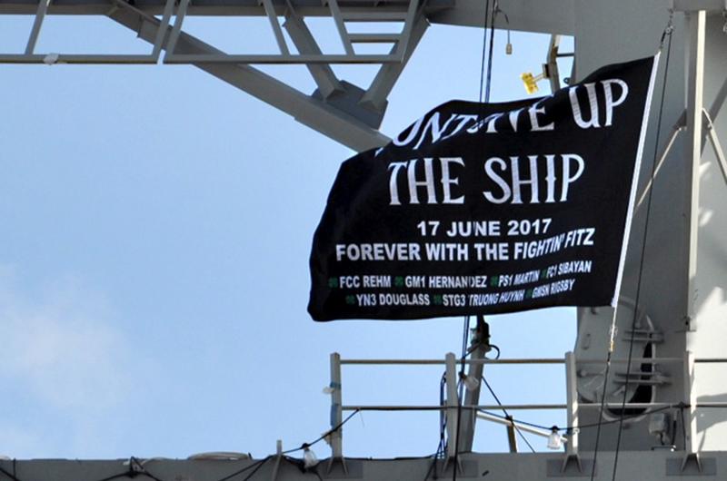 USS Fitzgerald has unveiled a commemorative flag honoring the seven sailors 