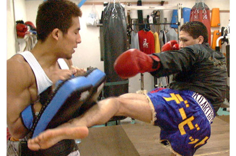 David Archuleta, right, mixes it up with sparing partner Masaaki Kato.