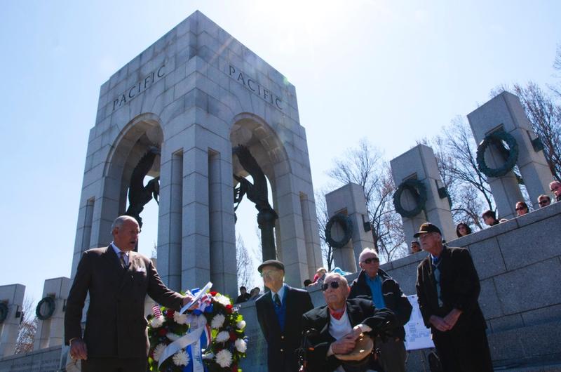 Josiah Bunting III, chairman of the Friends of the National WWII Memorial, honors veterans who fought in the Battle of Okinawa on April 1, 2015.