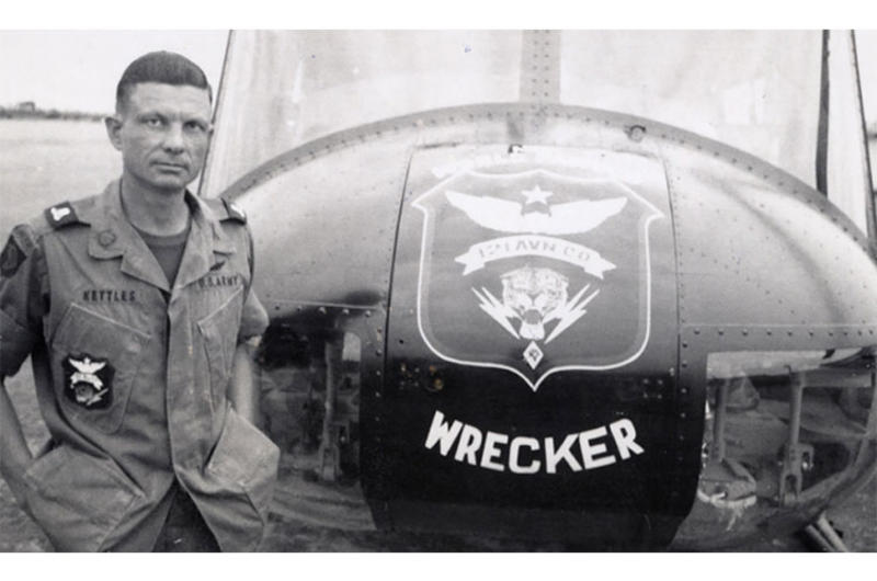U.S. Army Maj. Charles Kettles, posing in front of a 121st Aviation Company UH-1H, during his second Vietnam tour of duty, 1969.
