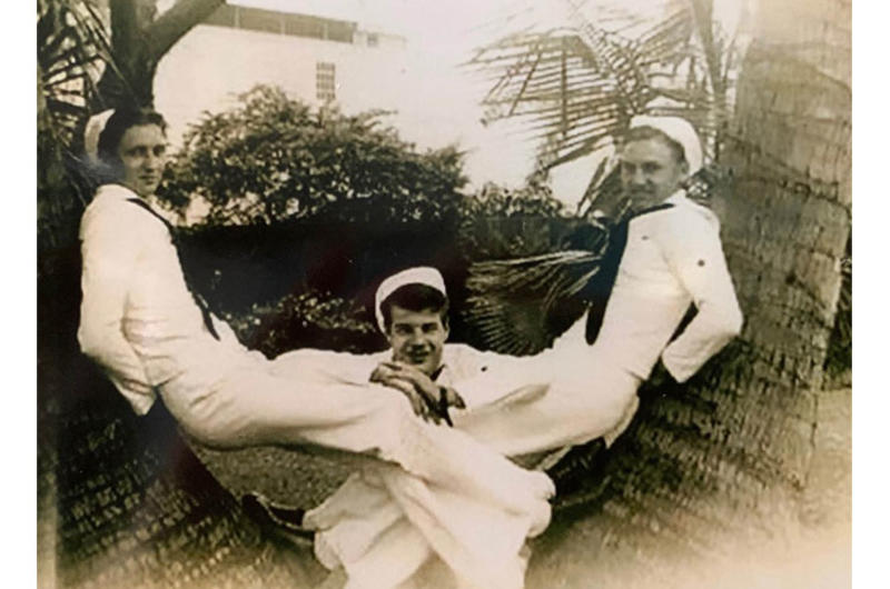 Elmer Halley, right, poses for a photo taken during World War II.