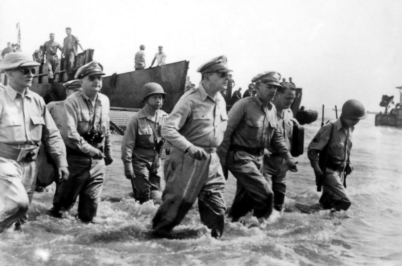 Douglas MacArthur with others wades ashore during the Battle of Leyte