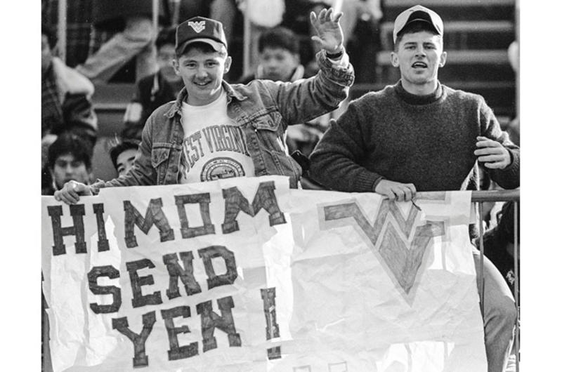 U.S. Marines Jack Bejo, Harold Loving and Greg Devolpe, left to right, enjoy the 1989 Japan Bowl.