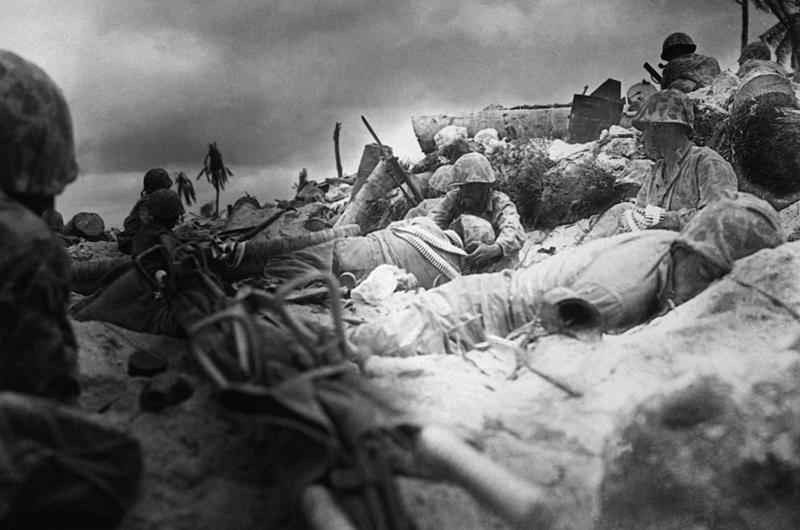black and white photo of Marines fighting