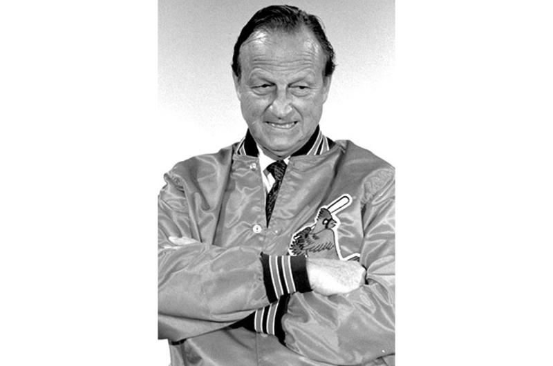 Stan Musial talks with servicemembers in Tokyo in 1988.