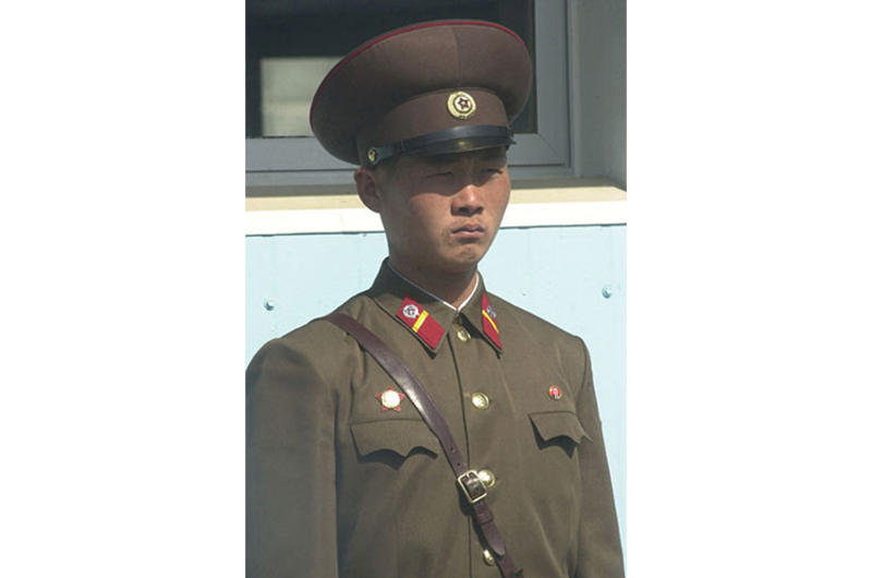 A North Korean soldier stands near a U.N. conference building in the Joint Security Area Wednesday at Panmunjom during a media tour.