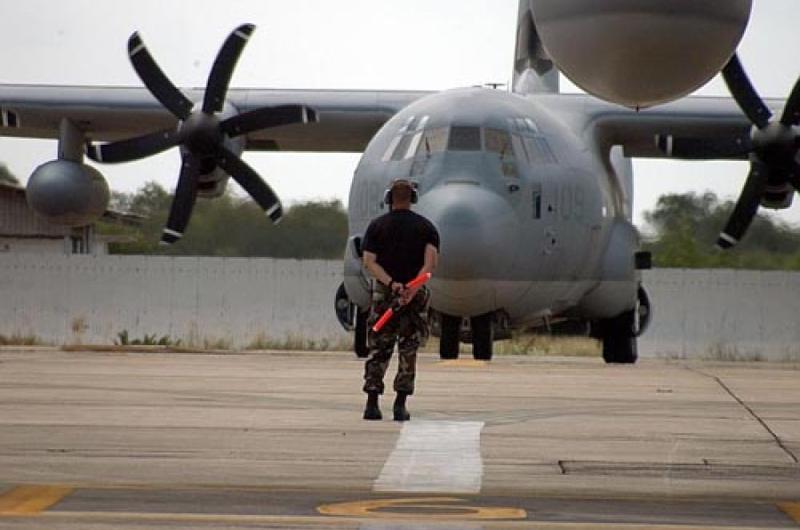 C130 cargo plane sites on the runway at Utapao Air Base in Thailand