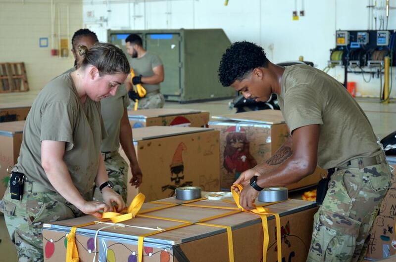 Airmen at Andersen Air Force Base, Guam, complete final preparations for supply bundles bound for remote Pacific islands as part of Operation Christmas Drop, Monday, Dec. 5, 2022.