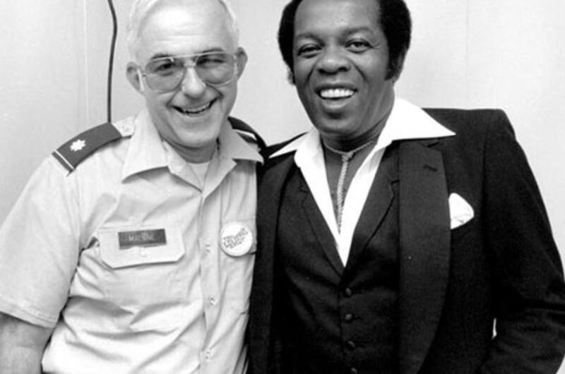 Lou Rawls, right, poses for a photo backstage during the Philippines portion of his 1983 USO tour of the Far East.