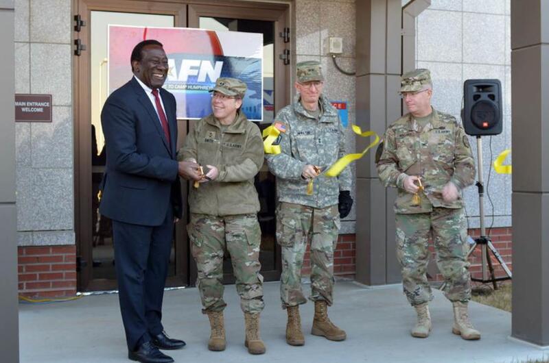 From left to right: Ray Shepherd, Defense Media Activity director; Brig. Gen. Tammy Smith, 8th Army deputy commanding general for sustainment; Maj. Gen. James Walton, U.S. Forces Korea director of transformation and restationing; and Col. Joseph Holland, Camp Humphreys garrison commander; take part in a ribbon-cutting ceremony, Tuesday, Nov. 15, 2016, to mark the grand opening of American Forces Network Pacific Korea's new headquarters at Humphreys.