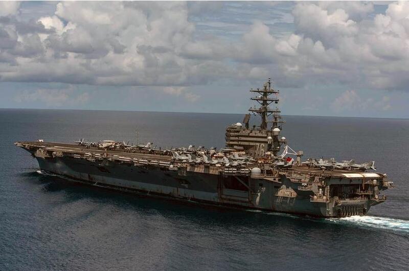 Coronavirus forced some of its crew to quarantine aboard the aircraft carrier USS Ronald Reagan, shown here in July 2019, at its homeport, Yokosuka Naval Base, Japan.