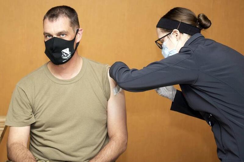 Col. Andrew Campbell, 374th Airlift Wing commander, receives the Moderna COVID-19 vaccine at Yokota Air Base, Japan, Jan. 12, 2021.
