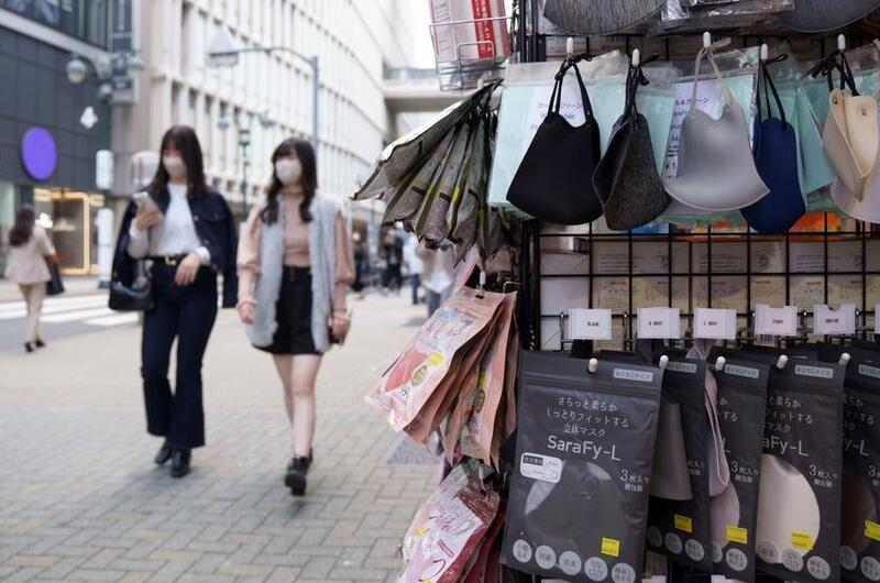 A variety of masks are for sale in Tokyo's popular Shibuya district, Friday, March 10, 2023.